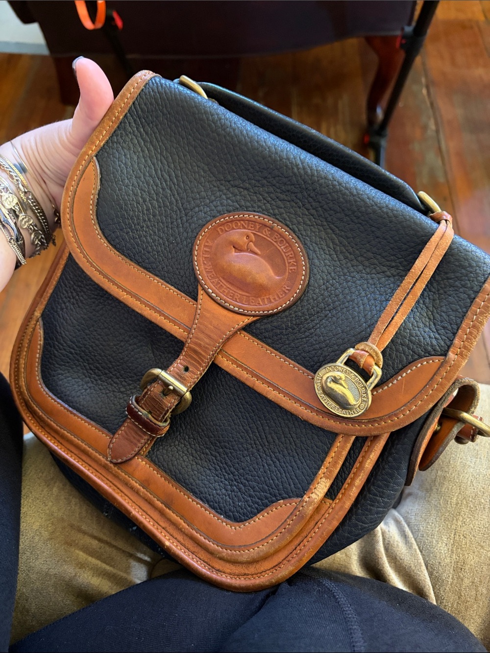 Dooney & Bourke Black and Tan Leather Messenger Crossbody - Picture 2 of 5